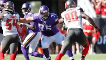 Oct 26, 2014; Tampa, FL, USA; Minnesota Vikings tackle Matt Kalil (75) blocks against the Tampa Bay Buccaneers during the second half at Raymond James Stadium. Minnesota Vikings defeated the Tampa Bay Buccaneers 19-13. Mandatory Credit: Kim Klement-USA TODAY Sports