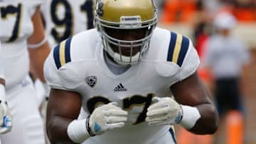 Aug 30, 2014; Charlottesville, VA, USA; UCLA Bruins defensive lineman Kenny Clark (97) participates in warm ups prior to the Bruins