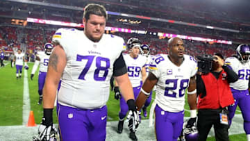 Dec 10, 2015; Glendale, AZ, USA; Minnesota Vikings guard Jeremiah Sirles (78) and running back Adrian Peterson (28) against the Arizona Cardinals at University of Phoenix Stadium. The Cardinals defeated the Vikings 23-20. Mandatory Credit: Mark J. Rebilas-USA TODAY Sports