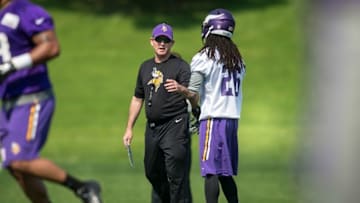 May 27, 2015; Eden Prairie, MN, USA; Minnesota Vikings head coach Mike Zimmer speaks with cornerback Trae Waynes (26) at practice at Winter Park. Mandatory Credit: Bruce Kluckhohn-USA TODAY Sports
