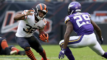 CHICAGO, ILLINOIS - SEPTEMBER 29: David Montgomery #32 of the Chicago Bears runs with the ball while being chased by Xavier Rhodes #29 of the Minnesota Vikings in the second quarter at Soldier Field on September 29, 2019 in Chicago, Illinois. (Photo by Dylan Buell/Getty Images)