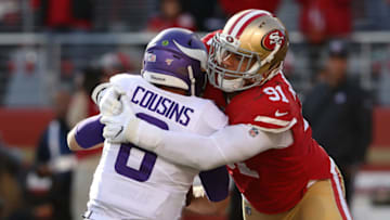 Kirk Cousins #8 of the Minnesota Vikings sacked by Arik Armstead #91 of the San Francisco 49ers (Photo by Sean M. Haffey/Getty Images)