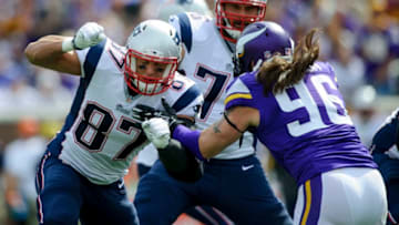 MINNEAPOLIS, MN - SEPTEMBER 14: Rob Gronkowski #87 of the New England Patriots blocks Brian Robison #96 of the Minnesota Vikings during the game on September 14, 2014 at TCF Bank Stadium in Minneapolis, Minnesota. (Photo by Hannah Foslien/Getty Images)