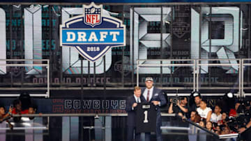 ARLINGTON, TX - APRIL 26: Kolton Miller of UCLA poses with NFL Commissioner Roger Goodell after being picked #15 overall by the Oakland Raiders during the first round of the 2018 NFL Draft at AT&T Stadium on April 26, 2018 in Arlington, Texas. (Photo by Tim Warner/Getty Images)