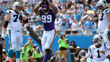 CHARLOTTE, NC - SEPTEMBER 25: Danielle Hunter #99 of the Minnesota Vikings reacts after sacking Cam Newton #1 of the Carolina Panthers for a safety during the game at Bank of America Stadium on September 25, 2016 in Charlotte, North Carolina. (Photo by Grant Halverson/Getty Images)