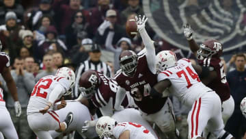 COLLEGE STATION, TEXAS - NOVEMBER 10: Daylon Mack #34 of the Texas A&M Aggies attempts to block the field goal attempt by Luke Logan #92 of the Mississippi Rebels in the fourth quarter at Kyle Field on November 10, 2018 in College Station, Texas. (Photo by Bob Levey/Getty Images)