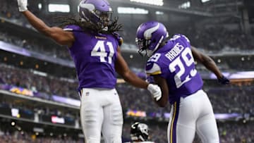 MINNEAPOLIS, MINNESOTA - SEPTEMBER 08: Anthony Harris #41 and Xavier Rhodes #29 of the Minnesota Vikings celebrate an interception in the end zone against the Atlanta Falcons by Harris during the third quarter of the game at U.S. Bank Stadium on September 8, 2019 in Minneapolis, Minnesota. (Photo by Hannah Foslien/Getty Images)