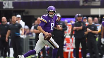 MINNEAPOLIS, MN - SEPTEMBER 22: Kirk Cousins #8 of the Minnesota Vikings scrambles for a first down against the Oakland Raiders in the first quarter at U.S. Bank Stadium on September 22, 2019 in Minneapolis, Minnesota. (Photo by Adam Bettcher/Getty Images)
