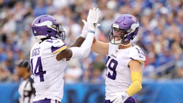 (Photo by Elsa/Getty Images) Stefon Diggs and Adam Thielen