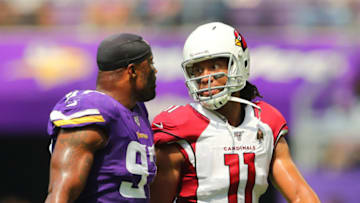 Everson Griffen #97 of the Minnesota Vikings and Larry Fitzgerald #11 of the Arizona Cardinals (Photo by Adam Bettcher/Getty Images)