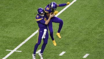 (Photo by Stephen Maturen/Getty Images) Kirk Cousins and Justin Jefferson