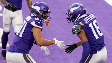 (Photo by Stephen Maturen/Getty Images) Bisi Johnson and Justin Jefferson