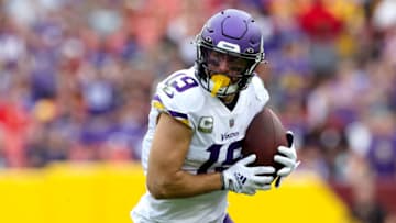 LANDOVER, MARYLAND - NOVEMBER 06: Adam Thielen #19 of the Minnesota Vikings runs with the ball after a catch during the game against the Washington Commanders at FedExField on November 06, 2022 in Landover, Maryland. (Photo by Todd Olszewski/Getty Images)