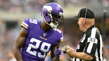 Sep 29, 2019; Chicago, IL, USA; Minnesota Vikings cornerback Xavier Rhodes (29) argues in the third quarter with field judge Steve Zimmer (33) at Soldier Field. Mandatory Credit: Quinn Harris-USA TODAY Sports