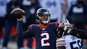 Dec 13, 2020; Chicago, Illinois, USA; Houston Texans quarterback AJ McCarron (2) passes in the second half against Chicago Bears inside linebacker Roquan Smith (58) at Soldier Field. Mandatory Credit: Quinn Harris-USA TODAY Sports