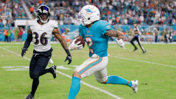Nov 11, 2021; Miami Gardens, Florida, USA; Miami Dolphins wide receiver Albert Wilson (2) runs with the football against Baltimore Ravens safety Chuck Clark (36) during the fourth quarter at Hard Rock Stadium. Mandatory Credit: Sam Navarro-USA TODAY Sports