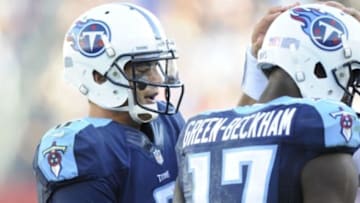 Dec 6, 2015; Nashville, TN, USA; Tennessee Titans receiver Dorial Green-Beckham (17) celebrates with quarterback Marcus Mariota (8) after scoring a touchdown during the second half against the Jacksonville Jaguars at Nissan Stadium. Mandatory Credit: Christopher Hanewinckel-USA TODAY Sports