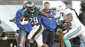 Nov 15, 2015; Philadelphia, PA, USA; Philadelphia Eagles running back DeMarco Murray (29) pushes away Miami Dolphins outside linebacker Koa Misi (55) during the fourth quarter at Lincoln Financial Field. The Dolphins won 20-19. Mandatory Credit: Eric Hartline-USA TODAY Sports