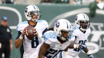 Dec 13, 2015; East Rutherford, NJ, USA; Tennessee Titans quarterback Marcus Mariota (8) looks to pass against the New York Jets at MetLife Stadium. The Jets won, 30-8. Mandatory Credit: Vincent Carchietta-USA TODAY Sports