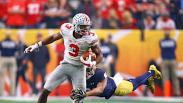 Jan 1, 2016; Glendale, AZ, USA; Ohio State Buckeyes wide receiver Michael Thomas (3) is tackled by diving Notre Dame Fighting Irish cornerback Nick Watkins in the second half during the 2016 Fiesta Bowl at University of Phoenix Stadium. The Buckeyes defeated the Fighting Irish 44-28. Mandatory Credit: Mark J. Rebilas-USA TODAY Sports