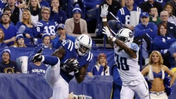 Jan 3, 2016; Indianapolis, IN, USA; Indianapolis Colts wide receiver Andre Johnson (81) catches a pass for a touchdown against Tennessee Titans cornerback B.W. Webb (38) at Lucas Oil Stadium. Mandatory Credit: Brian Spurlock-USA TODAY Sports