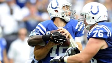 Sep 27, 2015; Nashville, TN, USA; Indianapolis Colts quarterback Andrew Luck (12) is sacked by Tennessee Titans linebacker Brian Orakpo (98) during the first half at Nissan Stadium. Mandatory Credit: Christopher Hanewinckel-USA TODAY Sports