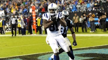 Nov 2, 2015; Charlotte, NC, USA; Indianapolis Colts wide receiver Andre Johnson (81) makes a reception for a touchdown as he is defended by Carolina Panthers cornerback Bene