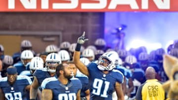 Aug 13, 2016; Nashville, TN, USA; Tennessee Titans outside linebacker Derrick Morgan (91) enters the field with his teammates prior to the game against the San Diego Chargers at Nissan Stadium. Tennessee won 27-10. Mandatory Credit: Jim Brown-USA TODAY Sports
