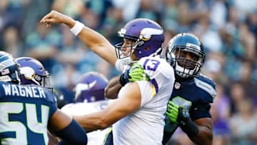 Aug 18, 2016; Seattle, WA, USA; Seattle Seahawks outside linebacker K.J. Wright (50) pressures Minnesota Vikings quarterback Shaun Hill (13) during the first quarter at CenturyLink Field. Minnesota defeated Seattle, 18-11. Mandatory Credit: Joe Nicholson-USA TODAY Sports