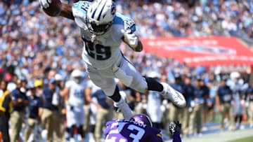 Sep 11, 2016; Nashville, TN, USA; Tennessee Titans running back DeMarco Murray (29) leaps over Minnesota Vikings cornerback Terence Newman (23) for a touchdown during the first half at Nissan Stadium. Mandatory Credit: Christopher Hanewinckel-USA TODAY Sports