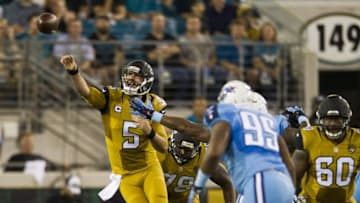Nov 19, 2015; Jacksonville, FL, USA; Jacksonville Jaguars quarterback Blake Bortles (5) throws a pass in the first quarter against the Tennessee Titans at EverBank Field. Mandatory Credit: Logan Bowles-USA TODAY Sports