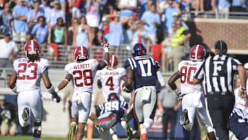 Sep 17, 2016; Oxford, MS, USA; Alabama Crimson Tide played react as defensive back Eddie Jackson (4) returns an interception for a touchdown the second quarter of the game against the Mississippi Rebels at Vaught-Hemingway Stadium. Alabama won 48-43. Mandatory Credit: Matt Bush-USA TODAY Sports