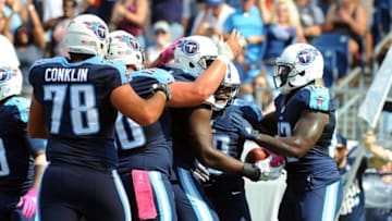 Oct 16, 2016; Nashville, TN, USA; Tennessee TItans players celebrate after a touchdown by receiver Rishard Matthews (18) in the first half against the Cleveland Browns at Nissan Stadium. Mandatory Credit: Christopher Hanewinckel-USA TODAY Sports
