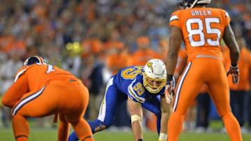 Oct 13, 2016; San Diego, CA, USA; San Diego Chargers defensive end Joey Bosa (99) and Denver Broncos tight end Virgil Green (85) await the snap during the third quarter at Qualcomm Stadium. Mandatory Credit: Jake Roth-USA TODAY Sports