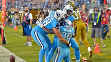 Oct 27, 2016; Nashville, TN, USA; Tennessee Titans running back DeMarco Murray (29) is congratulated by teammates Titans offensive tackle Jack Conklin (78) and Titans quarterback Marcus Mariota (8) for scoring a touchdown against the Jacksonville Jaguars during the first half at Nissan Stadium. Mandatory Credit: Jim Brown-USA TODAY Sports