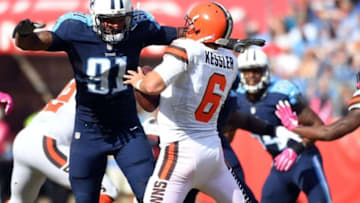 Oct 16, 2016; Nashville, TN, USA; Tennessee Titans linebacker Derrick Morgan (91) applies defensive pressure on Cleveland Browns quarterback Cody Kessler (6) in the second half at Nissan Stadium. Tennessee won 28-26. Mandatory Credit: Christopher Hanewinckel-USA TODAY Sports