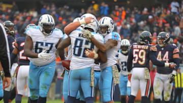 Nov 27, 2016; Chicago, IL, USA; Tennessee Titans tight end Delanie Walker (82) is congratulated for scoring a touchdown during the second quarter against the Chicago Bears at Soldier Field. Mandatory Credit: Dennis Wierzbicki-USA TODAY Sports