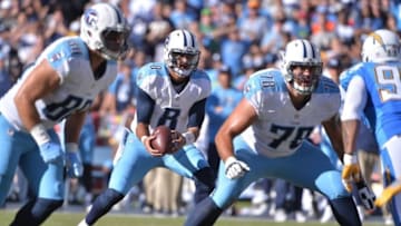 Nov 6, 2016; San Diego, CA, USA; Tennessee Titans quarterback Marcus Mariota (8) receives the snap as offensive tackle Jack Conklin (78) blocks San Diego Chargers defensive end Tenny Palepoi (95) during the second quarter at Qualcomm Stadium. San Diego won 43-35. Mandatory Credit: Orlando Ramirez-USA TODAY Sports