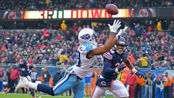 Nov 27, 2016; Chicago, IL, USA; Tennessee Titans wide receiver Rishard Matthews (18) catches a 29 yard touchdown pass over Chicago Bears free safety Adrian Amos (38) during the second quarter at Soldier Field. Mandatory Credit: Dennis Wierzbicki-USA TODAY Sports