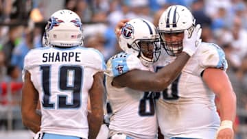 Nov 6, 2016; San Diego, CA, USA; Tennessee Titans tight end Delanie Walker (82) celebrates a touchdown score with teammate center Ben Jones (R) during the second half against the San Diego Chargers at Qualcomm Stadium. San Diego won 43-35. Mandatory Credit: Orlando Ramirez-USA TODAY Sports