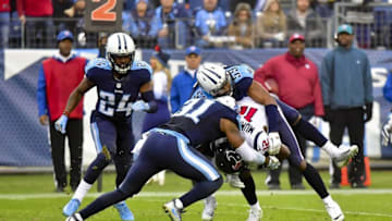 Jan 1, 2017; Nashville, TN, USA; Tennessee Titans free safety Kevin Byard (31) and Titans inside linebacker Wesley Woodyard (59) stop Houston Texans wide receiver Keith Mumphery (12) near the goal line during the second half at Nissan Stadium. Tennessee won 24-17. Mandatory Credit: Jim Brown-USA TODAY Sports