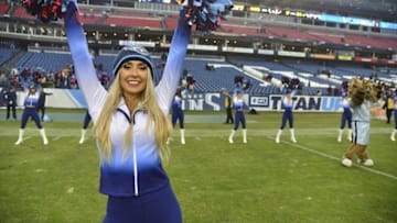 Jan 1, 2017; Nashville, TN, USA; Tennessee Titans Cheerleader entertains fans following the game against the Houston Texans at Nissan Stadium. Tennessee won 24-17. Mandatory Credit: Jim Brown-USA TODAY Sports