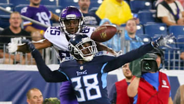 NASHVILLE, TN - AUGUST 30: Kenneth Durden #38 of the Tennessee Titans breaks up a pass to wide receiver Jeff Badet #85 of the Minnesota Vikings during the second half of a pre-season game at Nissan Stadium on August 30, 2018 in Nashville, Tennessee. (Photo by Frederick Breedon/Getty Images)