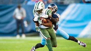 NASHVILLE, TN - DECEMBER 2: Wide receiver Quincy Enunwa #81 of the New York Jets carries the ball against Logan Ryan #26 of the Tennessee Titans during a NFL game at Nissan Stadium on December 2, 2018 in Nashville, Tennessee. (Photo by Ronald C. Modra/Getty Images)