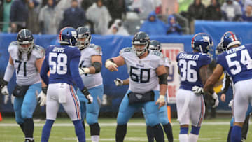 EAST RUTHERFORD, NJ - DECEMBER 16: Center Ben Jones #60 of the Tennessee Titans in action in the rain against the New York Giants at MetLife Stadium on December 16, 2018 in East Rutherford, New Jersey. (Photo by Al Pereira/Getty Images)