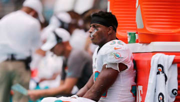 MIAMI, FLORIDA - SEPTEMBER 08: Kenyan Drake #32 of the Miami Dolphins reacts against the Baltimore Ravens during the second quarter at Hard Rock Stadium on September 08, 2019 in Miami, Florida. (Photo by Michael Reaves/Getty Images)