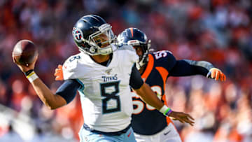 DENVER, CO - OCTOBER 13: Marcus Mariota #8 of the Tennessee Titans passes under pressure from Von Miller #58 of the Denver Broncos in the second quarter at Empower Field at Mile High on October 13, 2019 in Denver, Colorado. (Photo by Dustin Bradford/Getty Images)