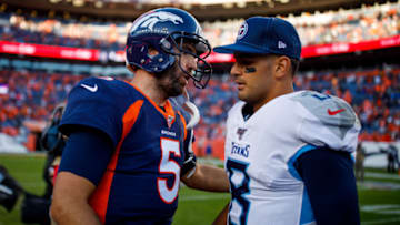 DENVER, CO - OCTOBER 13: Quarterback Joe Flacco #5 of the Denver Broncos talks with quarterback Marcus Mariota #8 of the Tennessee Titans after the game at Empower Field at Mile High on October 13, 2019 in Denver, Colorado. The Broncos defeated the Titans 16-0. (Photo by Justin Edmonds/Getty Images)