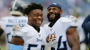 NASHVILLE, TENNESSEE - OCTOBER 06: Jayon Brown #55 and Rashaan Evans #54 talk before playing the Buffalo Bills at Nissan Stadium on October 06, 2019 in Nashville, Tennessee. (Photo by Silas Walker/Getty Images)