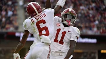 COLLEGE STATION, TEXAS - OCTOBER 12: Wide receiver DeVonta Smith #6 of the Alabama Crimson Tide celebrates with wide receiver Henry Ruggs III #11 of the Alabama Crimson Tide after a touchdown against Texas A&M Aggies at Kyle Field on October 12, 2019 in College Station, Texas. (Photo by Logan Riely/Getty Images)